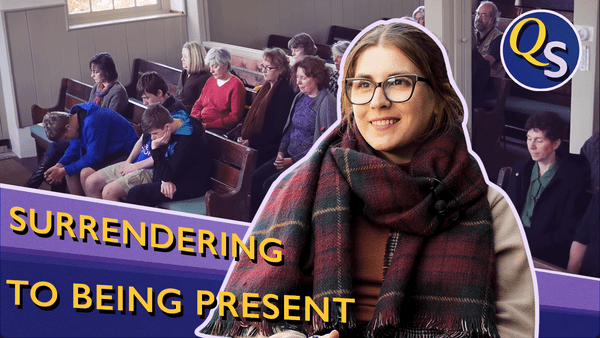 A woman wearing glasses and a scarf is smiling in the foreground. In the background, several people are sitting in pews of a church, deep in thought or prayer. Text reads "Surrendering to Being Present.